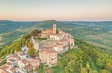 Obraz premium Drone panorama on historical Croatian town Motovun in Istria during sunrise in summer