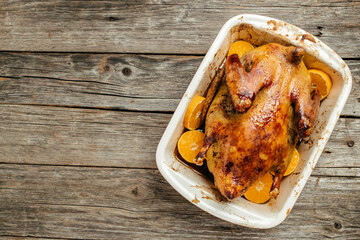 Roast duck with oranges in baking dish, Dish for Christmas Eve. banner, menu, recipe place for...