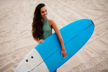  Beautiful smiling girl with surfboard. Hot sexy girl preparing for the surf