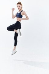 Fototapeta premium sportive woman jumping workout energy active lifestyle