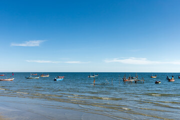 Fisherman's boat Parked on the coast in the sea of ​​Thailand.