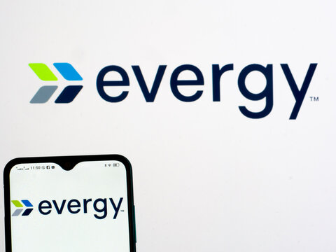 In this photo illustration Evergy logo seen displayed on a smartphone