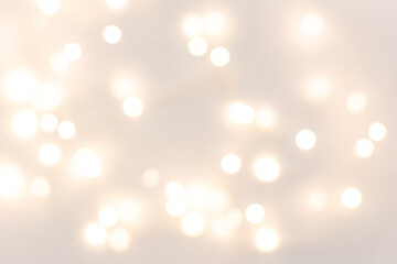 Defocus Christmas lights on a grey background. Copy space