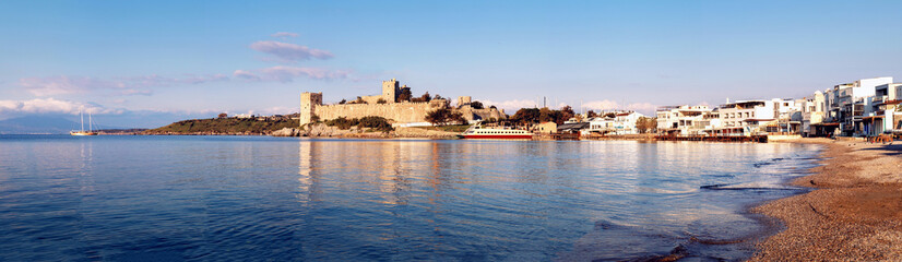 Fototapeta premium Panoramic photo of Bodrum castle when sun rising in Bodrum, Mugla, Turkey. Tourism and leisure concept.