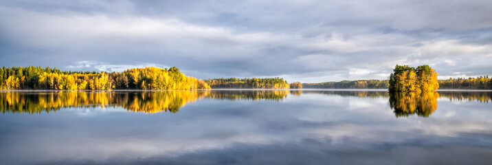 Morning panorama landscape of October lake © Piotr Wawrzyniuk