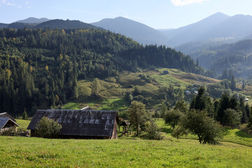 Beautiful view of village in mountains on sunny day