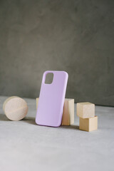 Protective silicone case for smartphone. Wooden cubes.