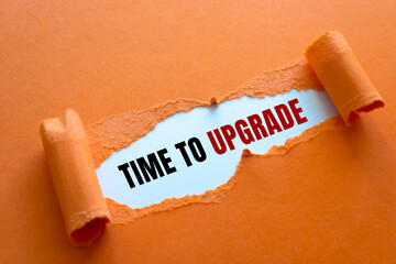 TIME TO UPGRADE written under torn paper.
