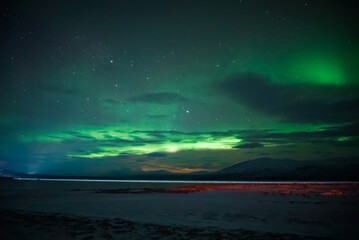 Fototapeta na wymiar aurora borealis northern lights polar lights lapland night landscape