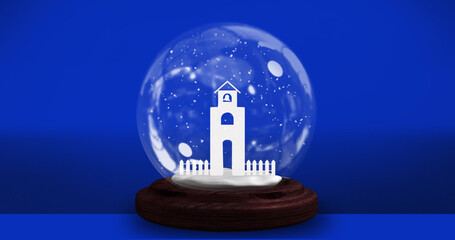 Image of christmas snow globe over blue background