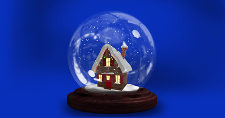 Image of christmas snow globe with house over blue background