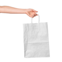 Female hand holding paper shopping bag isolated on white background. Black Friday sales concept. High quality photo mockup of packaging