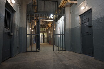 bars and empty prison corridors - obrazy, fototapety, plakaty