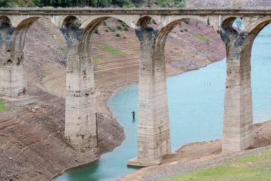 Abandoned bridge over the Barrios de Luna Reservoir, León Province, Spain.