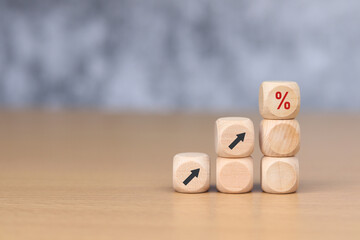 wooden cube block with percentage symbol icon, Finance and mortgage concept. interest rate