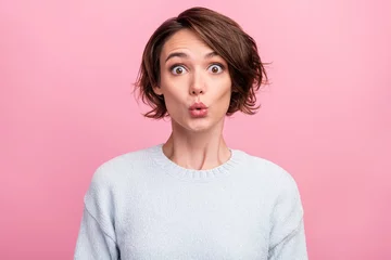 Deurstickers Photo of crazy shocked funny lady omg reaction look camera wear blue sweater isolated pink color background © deagreez