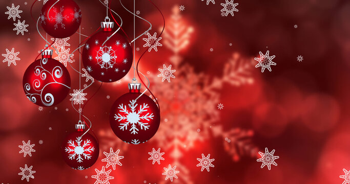 Image of snow falling and christmas baubles over snowflake on red background