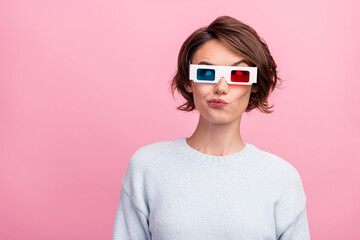 Photo of doubtful lady think look empty space wear 3d glasses blue sweater isolated pink color background