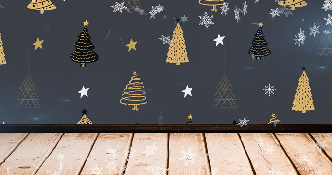 Image of snow falling over christmas trees and decorations on black background
