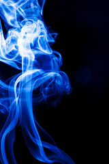 Motion blue smoke on black background. - 464051052