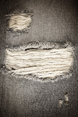 Vintage torn denim jeans texture. - obrazy, fototapety, plakaty