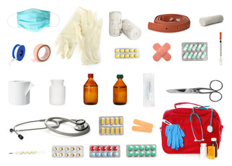 Obraz premium First aid kit. Set with different medical supplies on white background