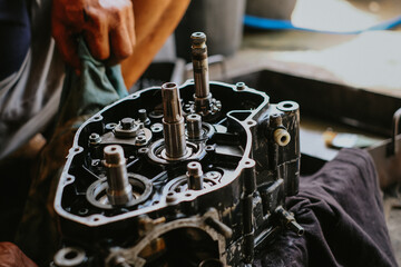 Maintenance of motorcycle engine clutch system by technicians