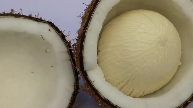 Close-up Video Shot Two slice Coconut on white Background