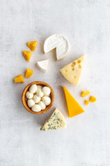 Fototapeta na wymiar Dairy products - various types of cheese top view