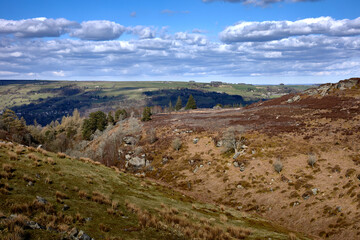 A view of Nidderdale in April across a deep gulley towards Pateley Bridge