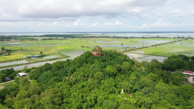 Aerial pan around Angkor Borei temple in Cambodia.