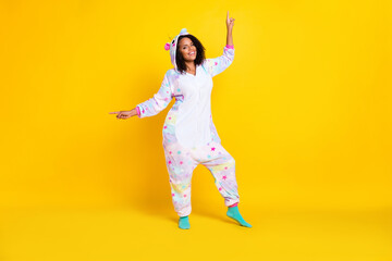 Full length photo of young afro woman happy positive smile dance party sleepover point fingers...