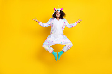 Full length photo of young afro woman happy positive smile jumper meditate yoga om isolated over...