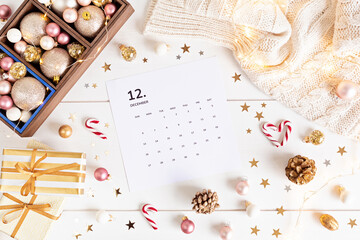 Christmas background with calendar for December and xmas decoration. Winter holidays celebration...