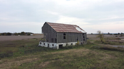 An aerial view of an abandoned barn s