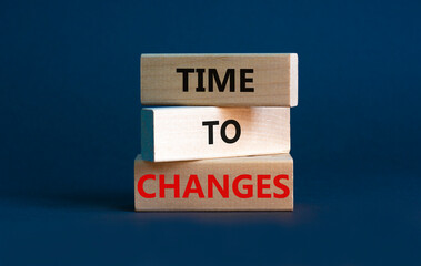 Time to changes symbol. Concept words 'Time to changes' on wooden blocks. Beautiful grey background. Business and time to changes concept. Copy space.