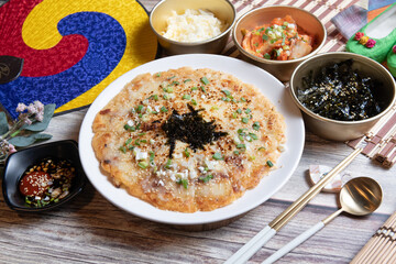 A kimchi pancake with seafood and cheese, Cheese Seafood Pajeon （Korean Pancake）