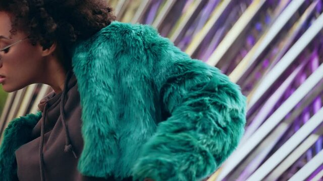 Independent African American woman performing rnb dance outdoors, lifestyle