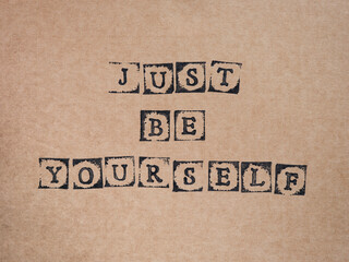 Cardboard with words Just Be Yourself