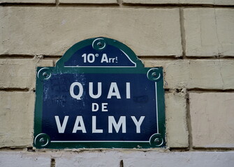 Quai de Valmy. Plaque de nom de rue. Paris.