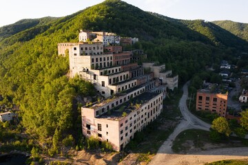 Fototapeta na wymiar A drone view of the abandoned building of the mining and processing plant