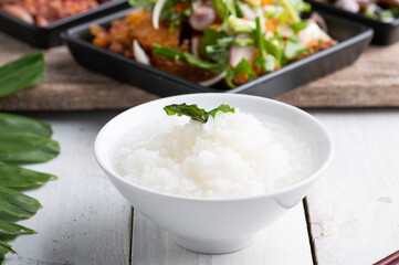 Mush or boiled rice in bowl asian food style