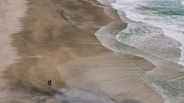 Water waves at Kvalvika beach on the Lofoten islands, Norway.