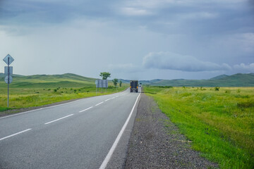 Fototapeta na wymiar Beautiful asphalt road in Khakassia in Siberia