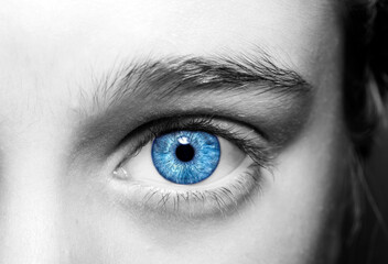 Beautiful insightful look blue eyes boy, close up  shot.