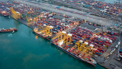 Aerial high angle view of container cargo ship and shipping port in the export and import industry...