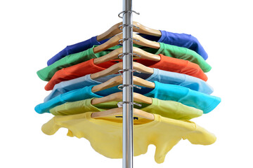 T-shirts of different colors hang on closing rack on wooden hangers are isolated on white...