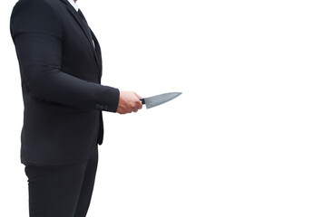 A businessman in a black suit stands holding a knife ready to attack his target. On a lonely white...