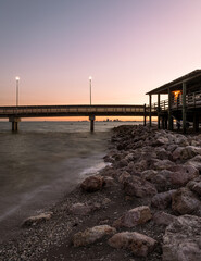 sunset at the Indian Point pier in Corpus Christi, Texas. - obrazy, fototapety, plakaty