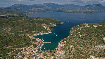 Fototapeta na wymiar Aerial drone photo of fjord bay and port of Vathi a natural sail boat anchorage in island of Meganisi, Ionian, Greece